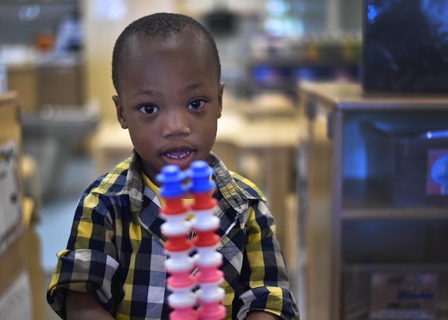 Martin, a military child, plays with his robot at the Joint Base Charleston Child Development Center in South Carolina, April 6, 2017. April was named Month of the Military Child by former Defense Secretary Casper Weinberger in 1989 to applaud military children for their daily sacrifices.