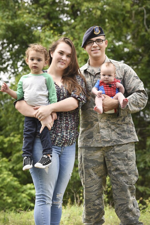 Kelsey Diaz, left, a former U.S. Air Force loadmaster and military spouse, and her husband Airman 1st Class Oscar Diaz, right, 628th Security Forces Squadron installation entry controller, hold their children at Hunley Park on Joint Base Charleston, S.C., April 25, 2017. Kelsey Diaz served as a loadmaster before her husband enlisted. In 1999, Congress designated the Friday before Mother’s Day as Military Spouse Appreciation Day to show appreciation for the sacrifices of military spouses.
