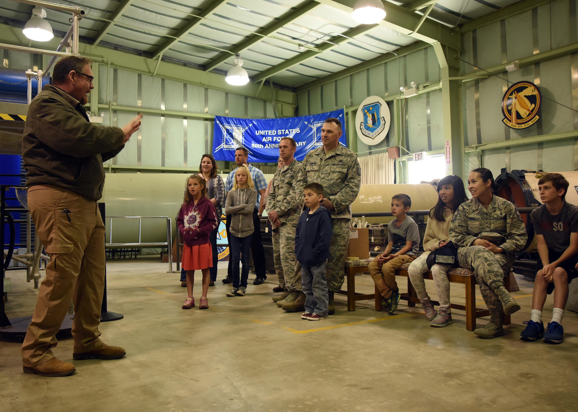 Jay Prichard, Vandenberg Space and Missile Technology Center director, teaches Vandenberg launch history during the SAMTEC Rocket Building Event, April 27, 2017, Vandenberg Air Force Base, Calif. Take Your Child to Work Day is the first annual trial of the program, which gives military youth an opportunity to see what their parents contribute to the space and missile mission. (U.S. Air Force photo by Airman 1st Class Clayton A. Wear/Released)