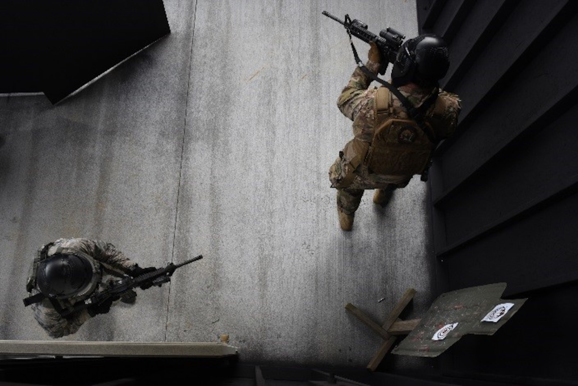 Members of the explosive ordnance disposal flight participated in a shoot, move and communicate challenge during Police week, April 20, 2017, at Seymour Johnson Air Force Base, North Carolina. The competition consisted of a team challenge in which they had to rescue hostages in a timely manner. (U.S. Air Force photo by Airman 1st Class Miranda A. Loera)