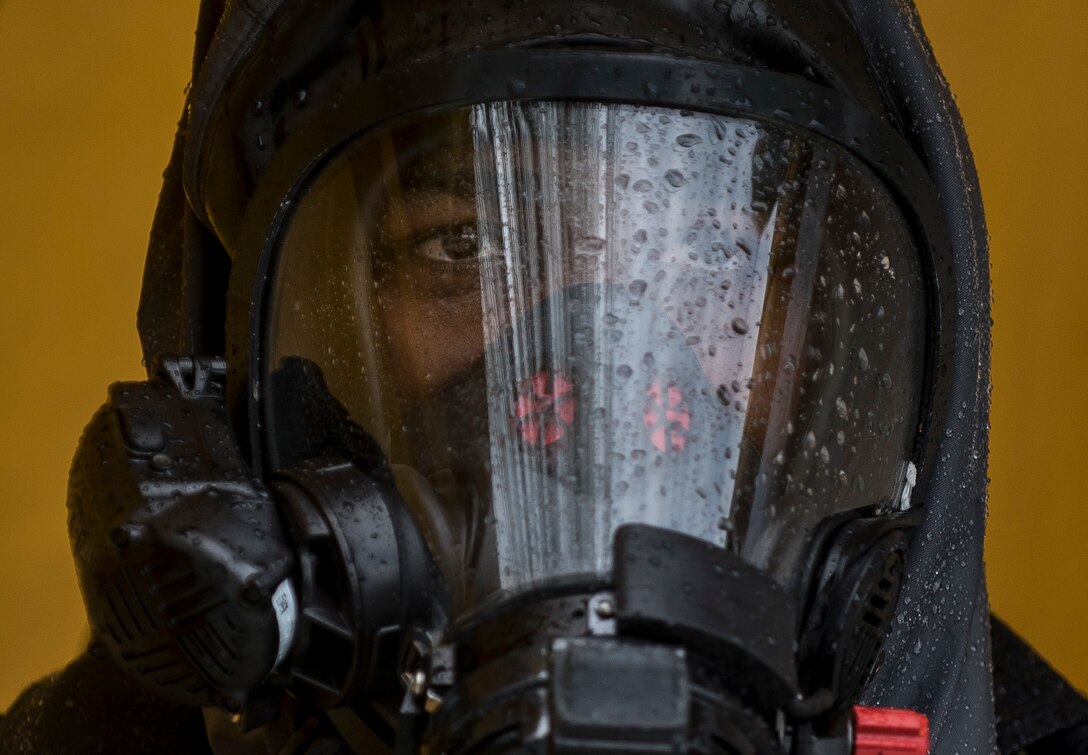 Pfc. Khalid Harrison, a U.S. Army Soldier with the 51st Chemical Biological Radiological Nuclear Company, of Fort Stewart, Georgia, waits to complete the decontamination process during Guardian Response 17 at the Muscatatuck Urban Training Center, Indiana, April 27, 2017. Guardian Response, as part of Vibrant Response, is a multi-component training exercise run by the U.S. Army Reserve designed to validate nearly 4,000 service members in Defense Support of Civil Authorities (DSCA) in the event of a Chemical, Biological, Radiological and Nuclear (CBRN) catastrophe. This year's exercise simulated an improvised nuclear device explosion with a source region electromagnetic pulse (SREMP) out to more than 4 miles. The 84th Training Command is the hosting organization for this exercise, with the training operations run by the 78th Training Division, headquartered in Fort Dix, New Jersey. (U.S. Army Reserve photo by Master Sgt. Michel Sauret)