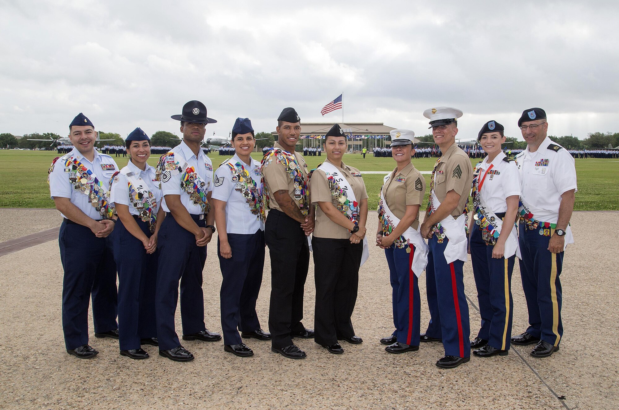 The 2017 Military Ambassadors pose for a photo April 21, 2017 at the Graduation Parade at Lackland Air Force Base, T.X. This year marks the 126th anniversary of the colorful Fiesta festivity, honoring traditions deeply rooted throughout the area and celebrating the historic partnerships between the Airmen of Joint Base San Antonio and the local community. (U.S. Air Force photo by Johnny Saldivar)