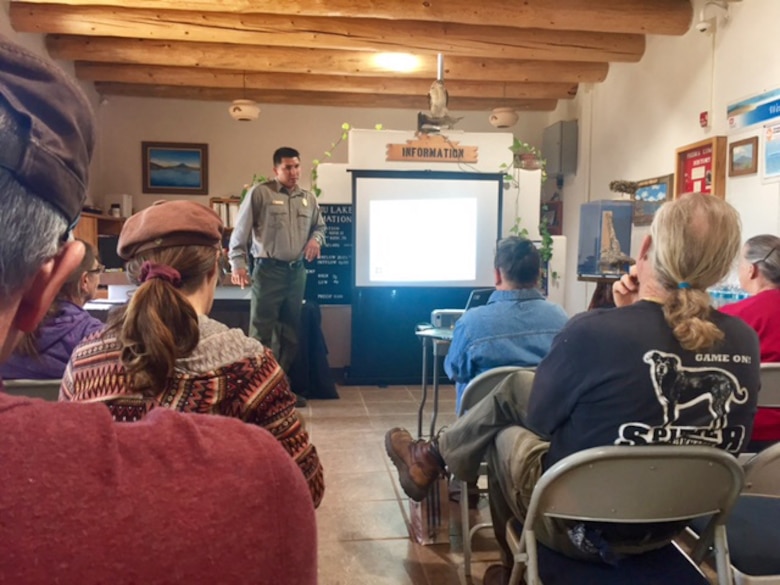 ABIQUIU LAKE, N.M. – Natural resource specialist and event organizer Nathaniel Naranjo speaks to those attending a pollinator party at the lake, April 22, 2017. Naranjo focused on improving pollinator habitat and why this is important.
