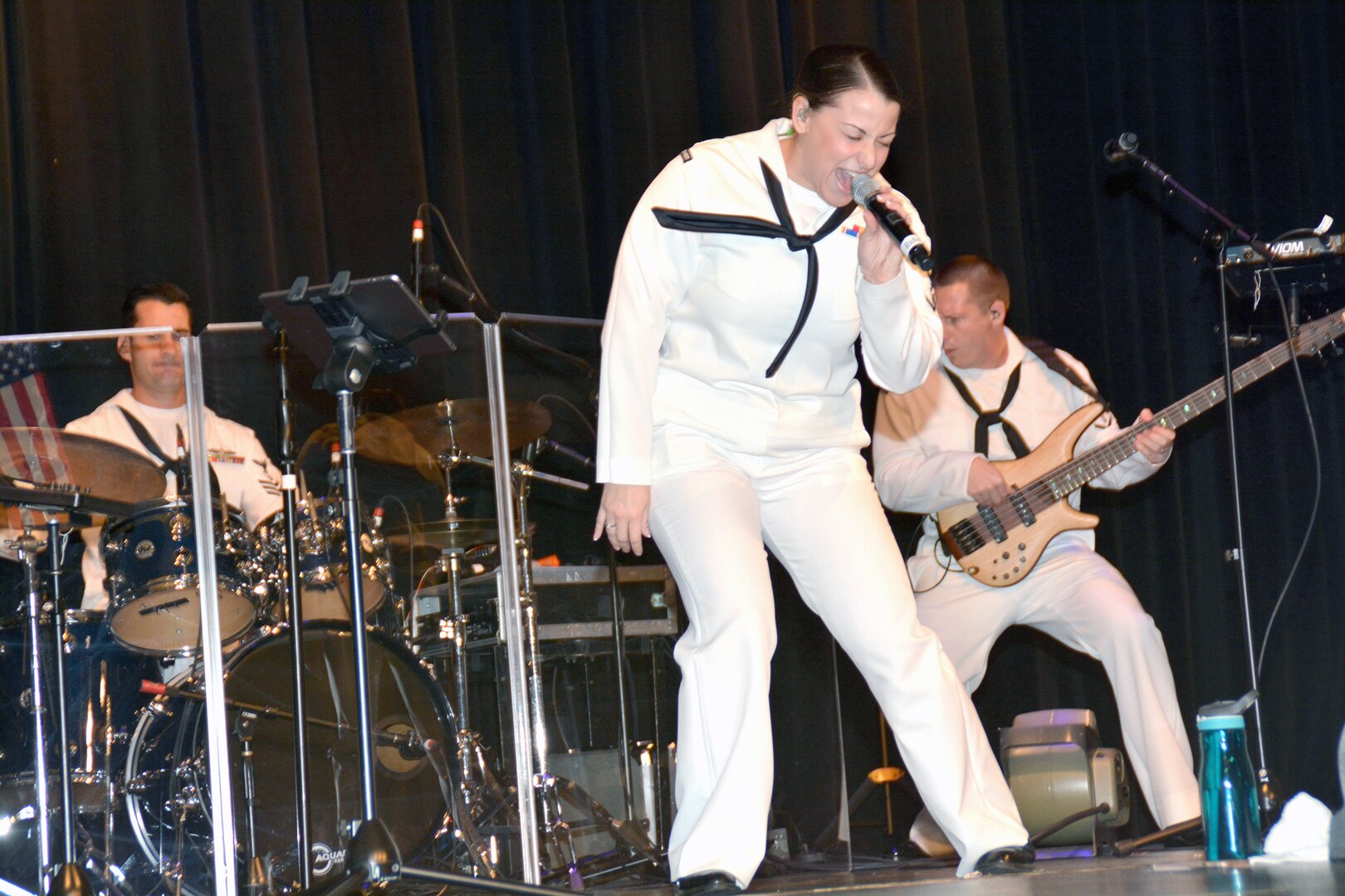 Petty Officer 3rd Class Rachel Shuttleworth of the “Destroyers”, the popular music group of Navy Band Southwest from San Diego, performs for students of Winston Churchill High School during Fiesta San Antonio 2017. The “Destroyers”, along with Sailors from Navy Recruiting District San Antonio and crew members from the USS San Antonio (LPD-17) homeported at Naval Station Norfolk, visited the school to conduct community outreach and spread Navy Awareness.
