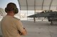 A Polish air force maintainer looks on as an F-16 Fighting Falcon prepares to taxi for a mission at the 407th Air Expeditionary Group, April 24, 2017. The Polish Airmen are part of the 60-nation coalition force supporting Operation Inherent Resolve in the fight against ISIS.  (U.S. Air Force photo/Master Sgt. Benjamin Wilson)(Released)
