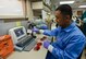 Senior Airman Daniel Demayo, 99th Medical Support Squadron laboratory technician, inserts an Anti Susceptibility Card into a Vitek2 machine in the Microbiology section of the Mike O’Callaghan Federal Medical Center at Nellis Air Force Base, Nev., April 24, 2017. Medical Laboratory Professionals Week provides the profession with a unique opportunity to increase public understanding of and appreciation for clinical laboratory personnel. (U.S. Air Force photo by Airman 1st Class Nathan Byrnes/Released)
