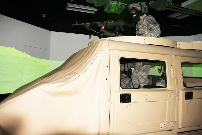 Soldiers training at Fort McCoy, Wis., for Operation Cold Steel practice firing weapons in a convoy on Reconfigurable Vehicle Tactical Trainer on April 12, 2017. Operation Cold Steel is the Army Reserve's first large-scale live-fire training and crew-served weapons qualification and validation exercise, which took place March 9 through April 25. (U.S. Army Photo by Aimee Malone, Public Affairs Office, Fort McCoy, Wis.)