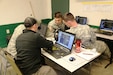 Soldiers at Fort McCoy for the Operation Cold Steel exercise learn about crew gunnery on the Virtual Battle Space software program April 10, 2017, at Range 26 on North Post. The training simulates Fort McCoy training areas and allows gunnery crews the ability to experience gunnery training before going out to a range to complete live-fire training. (U.S. Army Photo by Scott T. Sturkol, Public Affairs Office, Fort McCoy, Wis.)