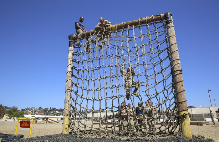 Recruits from India Company, 3rd Recruit Training Battalion, climb a rope wall during Confidence Course II at Marine Corps Recruit Depot San Diego, April 18. Many of the obstacles test the recruits’ confidence and mental strength in overcoming the challenges before them. Annually, more than 17,000 males recruited from the Western Recruiting Region are trained at MCRD San Diego. India Company is scheduled to graduate June 16.
