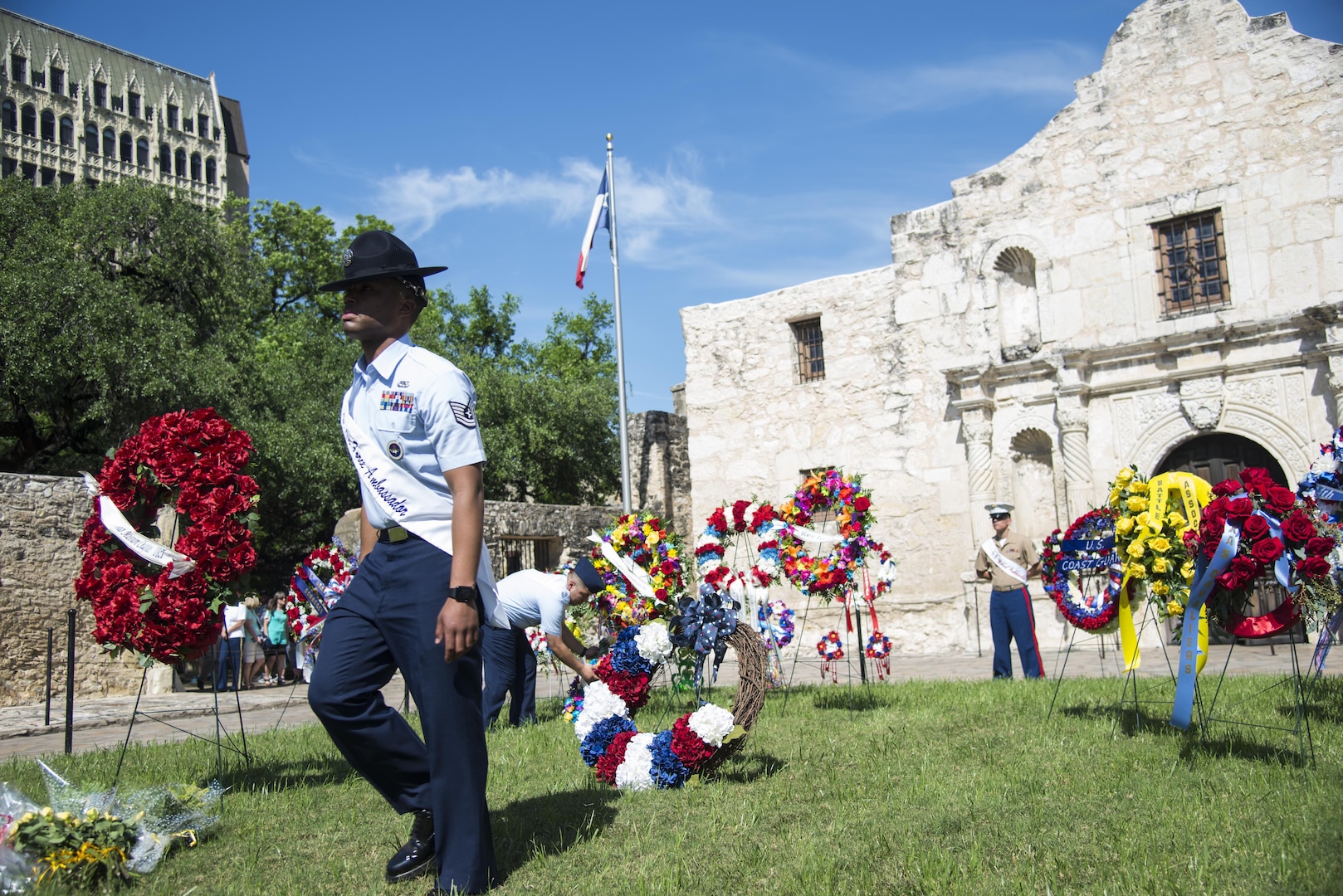 The 2017 military ambassadors display wreaths in front of the Alamo during the annual San Antonio Fiesta Pilgrimage to the Alamo event April 24, 2017. The pilgrimage is a processional and memorial tribute to the Alamo heroes and the heritage of Texas. 