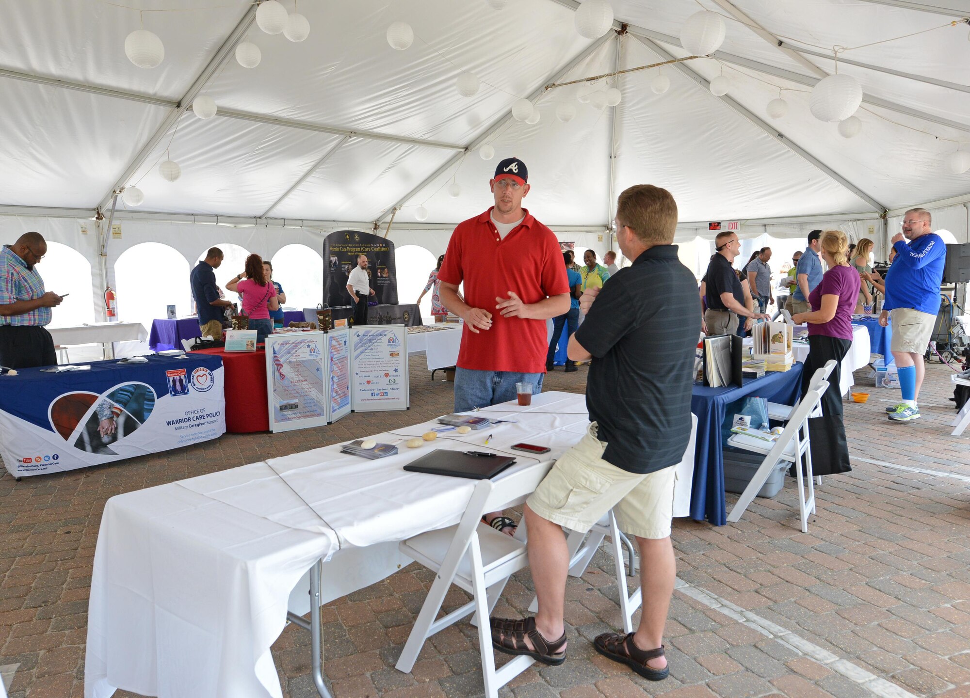 Warrior C.A.R.E. summit attendees meet with helping agencies at Portofino Island Resort, Pensacola Beach, FL, April 27, 2017. The summit provided resources for caregivers of wounded, injured or ill Air Commandos. (U.S. Air Force photo/Staff Sgt. Melanie Holochwost)