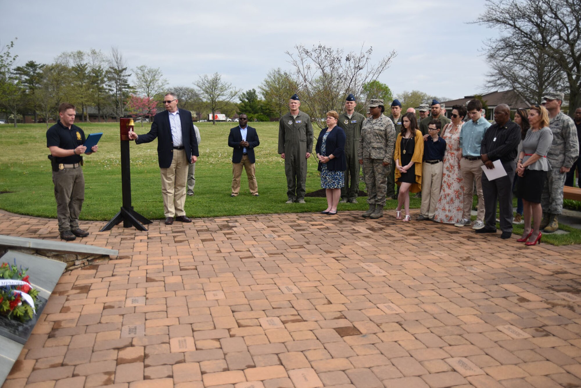 Attendees listen as the names of the fallen Air Advisors are called during the Air Advisor Memorial Ceremony, at Joint Base McGuire-Dix-Lakehurst, New Jersey, April 27, 2017.(U.S. Air Force photo/Brad Camara)