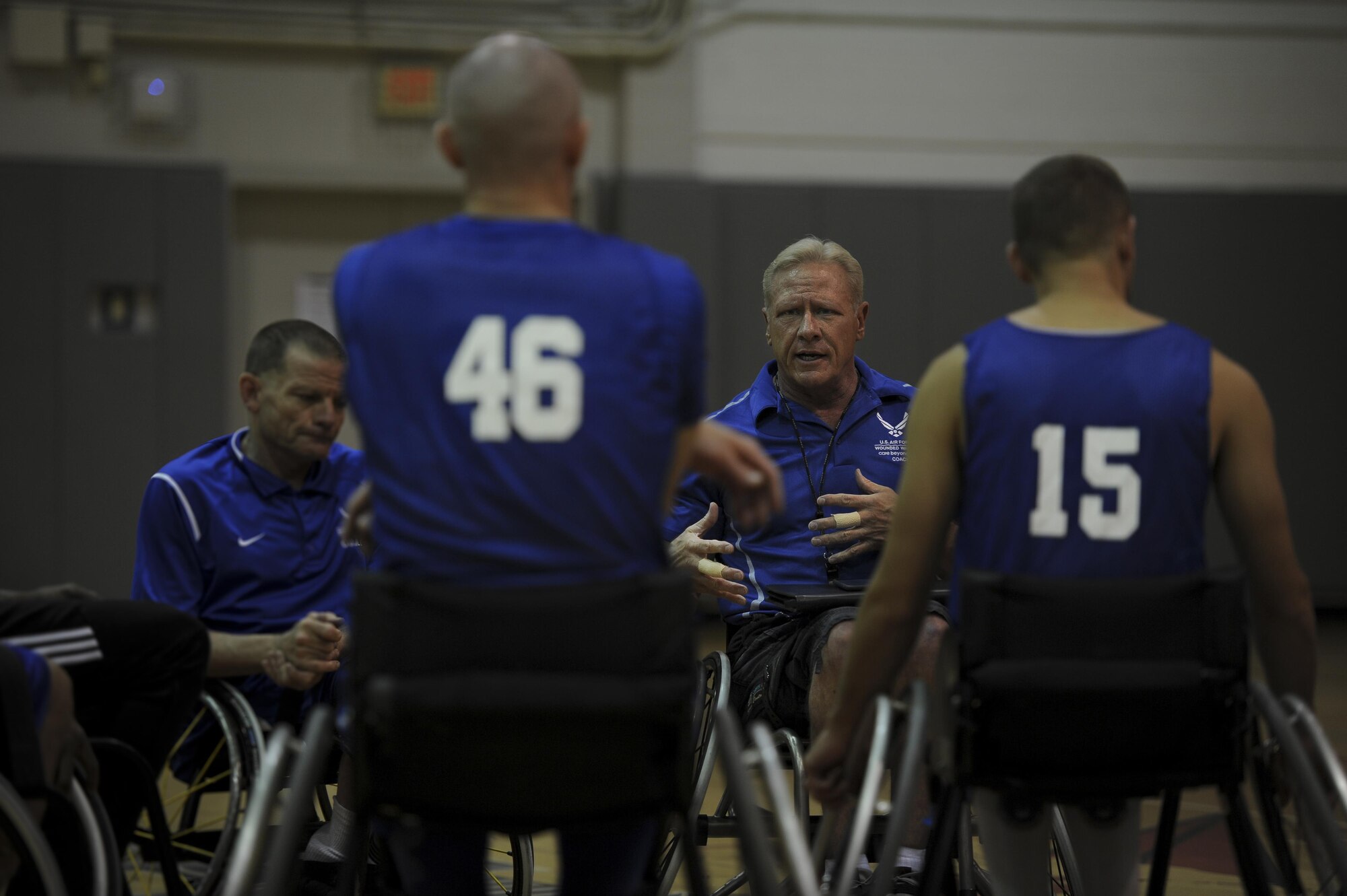 Mark Shepherd, the coach of the Air Force wheelchair basketball team, gives advice to his team during a practice at Hurlburt Field, Fla., April 24, 2017. Shepherd has been coaching for three years. The team is set to compete against other Department of Defense teams in June. (U.S. Air Force photo by Airman 1st Class Dennis Spain)