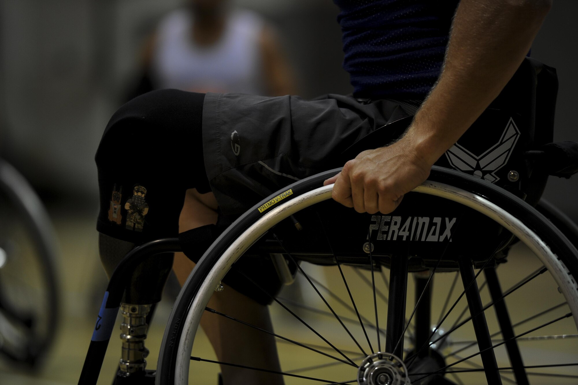 Ben Seekell, a point guard on the Air Force wheelchair basketball team, participates during practice at Hurlburt Field, Fla., April 24, 2017. The AF's team is set to compete with Department of Defense teams in June. (U.S. Air Force photo by Airman 1st Class Dennis Spain)