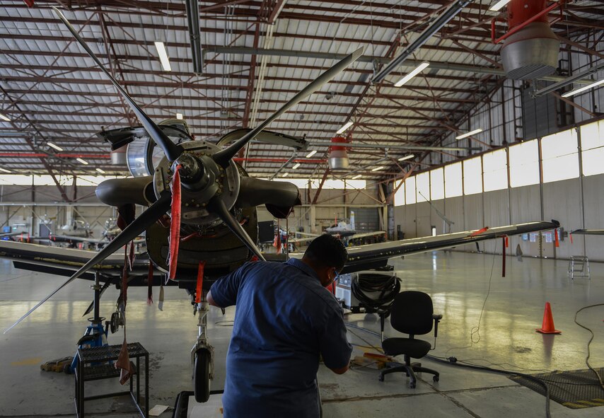 Alvaro Constancio, 47th Maintenance Directorate maintainer, sharpens the propeller of a T-6 Texan II on Laughlin Air Force Base, Texas, April 12, 2017. Constancio is part of the maintenance crew that restored Laughlin’s hangar queens, fixing nearly all 38 on Laughlin in a year and a half. A “hangar queen” is an aircraft that hasn’t been flown in more than 30 days. (U.S. Air Force photo/Airman 1st Class Benjamin N. Valmoja)