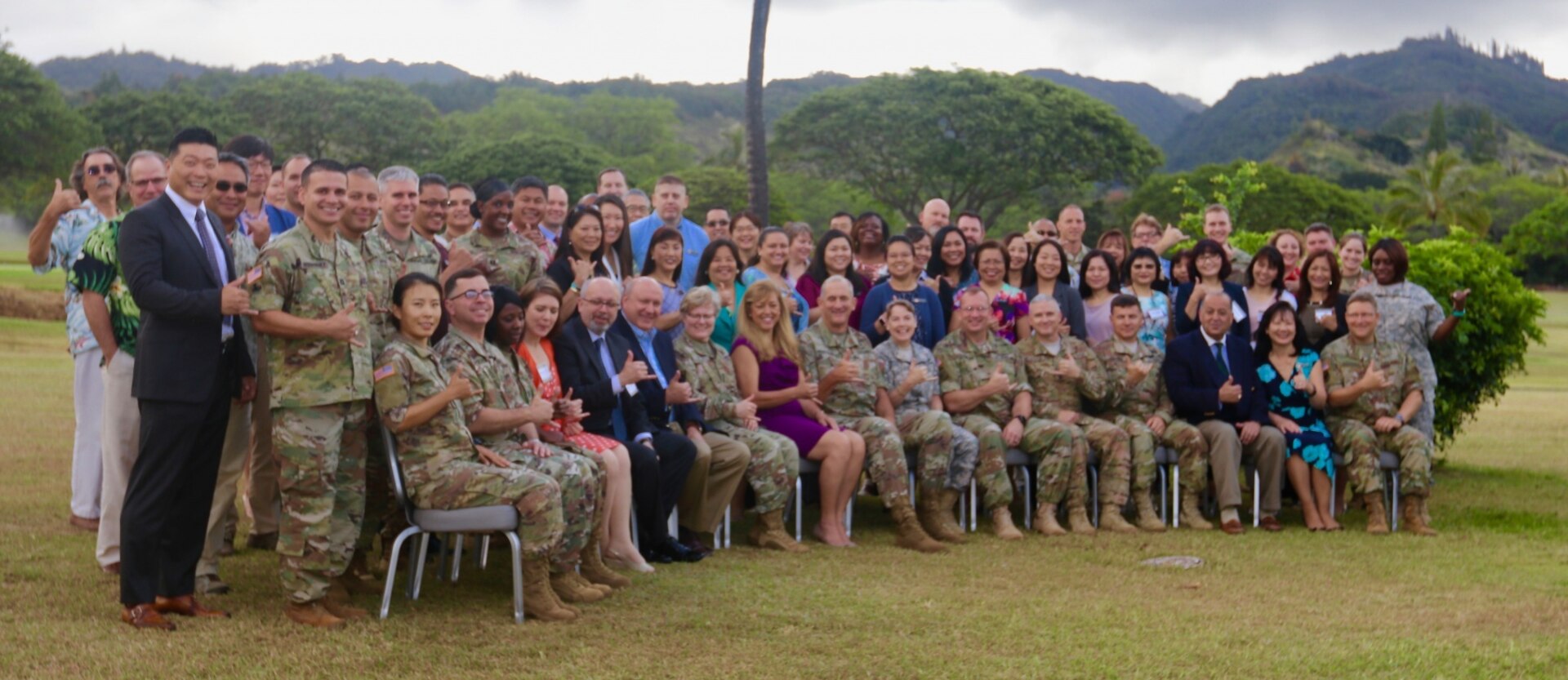 U.S. Army Pacific (USARPAC) resource management professionals display the "Shaka," a local Hawaiian symbol, during the USARPAC G-8 synchronization conference from Apr. 20-21, 2017 at Fort Shafter, HI. USARPAC G-8 synchronization conference is designed to bring Pacific financial managers together to discuss current and future issues, to develop partnerships and teamwork necessary to build a strong and cohesive Pacific recourse management community. 
