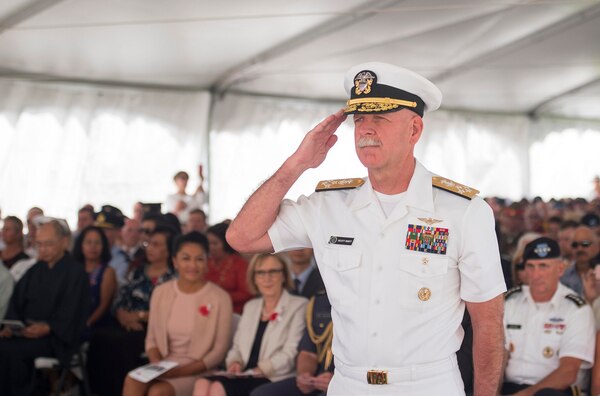 Adm. Scott Swift, commander of U.S. Pacific Fleet, renders honors after laying a wreath during an Australia and New Zealand Army Corps (ANZAC) Day ceremony at the National Memorial Cemetery of the Pacific, April 25. 
