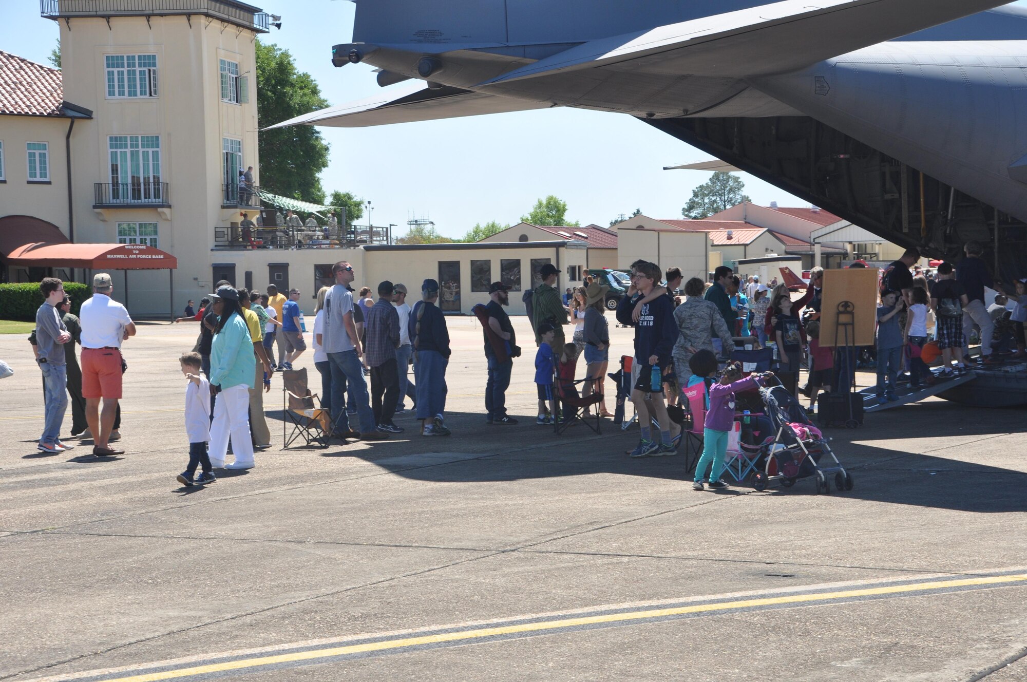 The 908th Airlift Wing provided a C-130 Hercules as a static display during the Air Show at Maxwell Air Force Base, Ala., April 8 and 9. Hundreds of people toured the aircraft while unit members explained how the aircraft helps the wing accomplish its mission. (U.S. Air Force photo by Bradley J. Clark)
