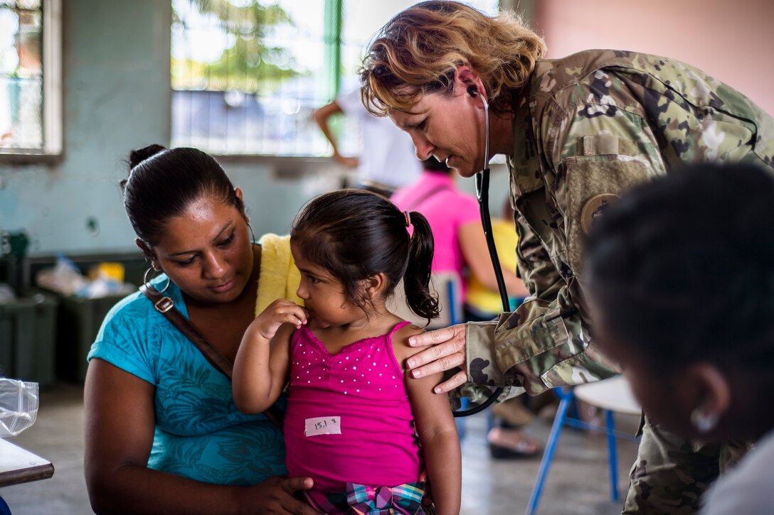 U.S. Army Sgt. 1st Class Lorraine Branson screens Honduran patients for medical problems at a Medical Readiness Training Exercise site at Cooperativa village, Colon, Honduras , Apr. 20, 2017. Joint Task Force – Bravo Medical Element, provided care to more than 850 patients during a Medical Readiness Training Exercise in Cooperativa village, Colon, Honduras, Apr. 20-21, 2017. MEDEL also supported a Military Partnership Engagement and assisted more than 650 patients with the Hondurian Navy in Santa Rosa de Aguan, Colon, Honduras, Apr. 22, 2017. (U.S. Air National Guard photo by Master Sgt. Scott Thompson/released)