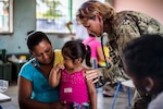 U.S. Army Sgt. 1st Class Lorraine Branson screens Honduran patients for medical problems at a Medical Readiness Training Exercise site at Cooperativa village, Colon, Honduras , Apr. 20, 2017. Joint Task Force – Bravo Medical Element, provided care to more than 850 patients during a Medical Readiness Training Exercise in Cooperativa village, Colon, Honduras, Apr. 20-21, 2017. MEDEL also supported a Military Partnership Engagement and assisted more than 650 patients with the Hondurian Navy in Santa Rosa de Aguan, Colon, Honduras, Apr. 22, 2017. (U.S. Air National Guard photo by Master Sgt. Scott Thompson/released)