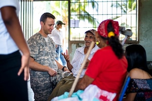 U.S. Army Capt. Adam West provides medical care to Honduran patients at a Medical Readiness Training Exercise site at Cooperativa village, Colon, Honduras , Apr. 21, 2017. Joint Task Force – Bravo Medical Element, provided care to more than 850 patients during a Medical Readiness Training Exercise in Cooperativa village, Colon, Honduras, Apr. 20-21, 2017. MEDEL also supported a Military Partnership Engagement and assisted more than 650 patients with the Hondurian Navy in Santa Rosa de Aguan, Colon, Honduras, Apr. 22, 2017. (U.S. Air National Guard photo by Master Sgt. Scott Thompson/released)