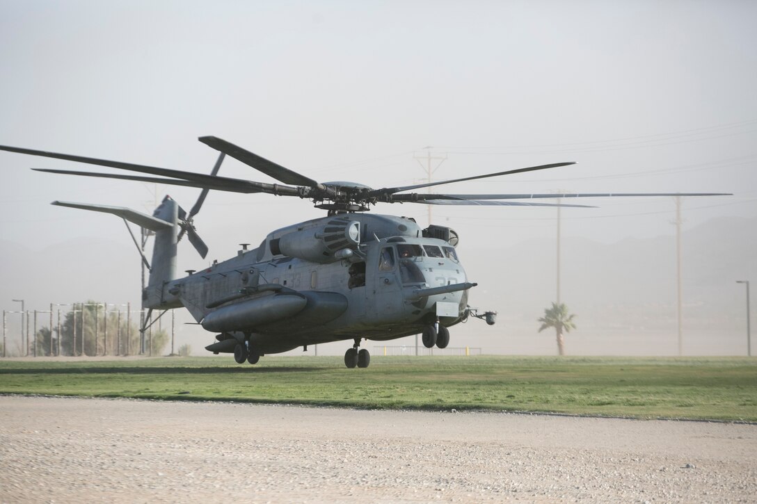 A CH-53 ‘Super Stallion’ helicopter lands at Del Valle Field during a non-combatant Evacuation Operation exercise as part of Weapons and Tactics Instructor Course 2-17 aboard Marine Corps Air Ground Combat Center Twentynine Palms, Calif., April 21, 2017. NEO exercises simulate real-life scenarios where non-combatants are evacuated from a potentially hostile area. (U.S. Marine Corps photo by Cpl. Julio McGraw)