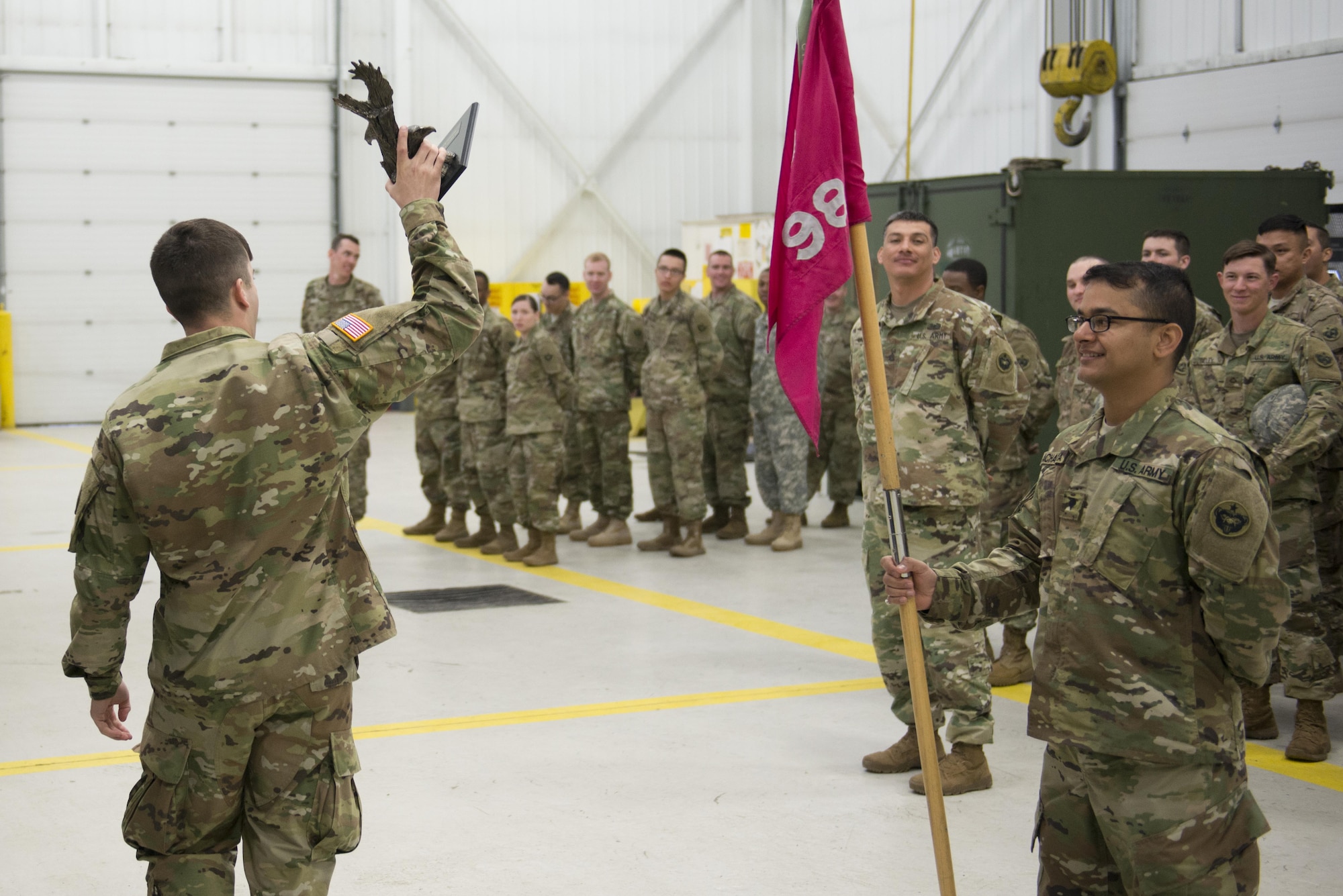 The 98th Support Maintenance Company, 17th Combat Sustainment Support Battalion stands in formation as their lieutenant briefs them on the day's training competition, April 28 on Joint Base Elmendorf-Richardson, Alaska. During the 98th Maintenance Rodeo, platoons compete in tasks ranging from changing a tire on a humvee to performing timed maintenance checks on ground equipment. 