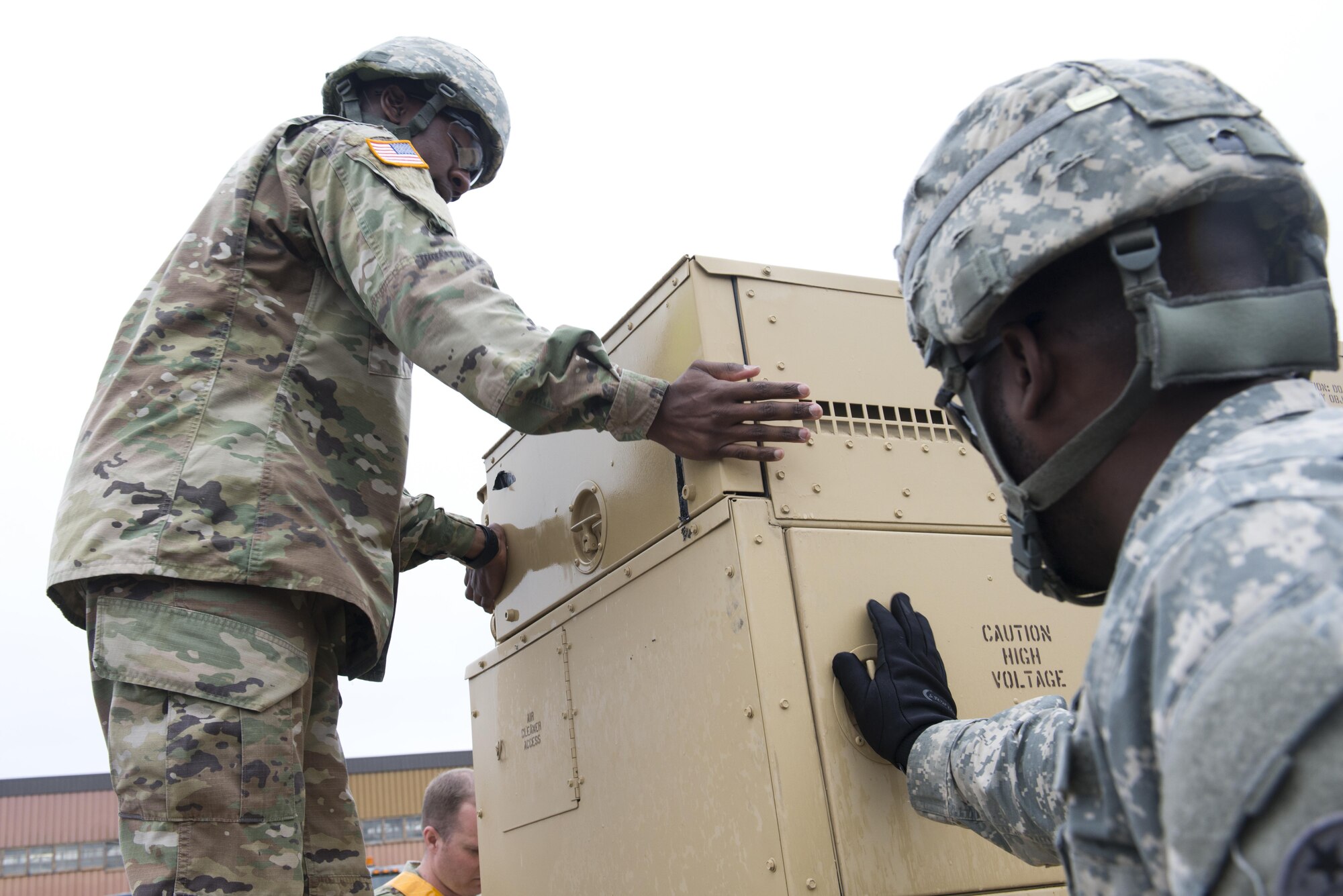 Pfc. Travis Graves, 98th Maintenance Company, 17th Combat Sustainment Support Battalion checks the hinges on ground equipment April 27 at Joint Base Elmendorf-Richardson, Alaska. Graves was competing in the 98th MC's maintenance rodeo wherein they tested their skill sets and developed inter-platoon bonds.