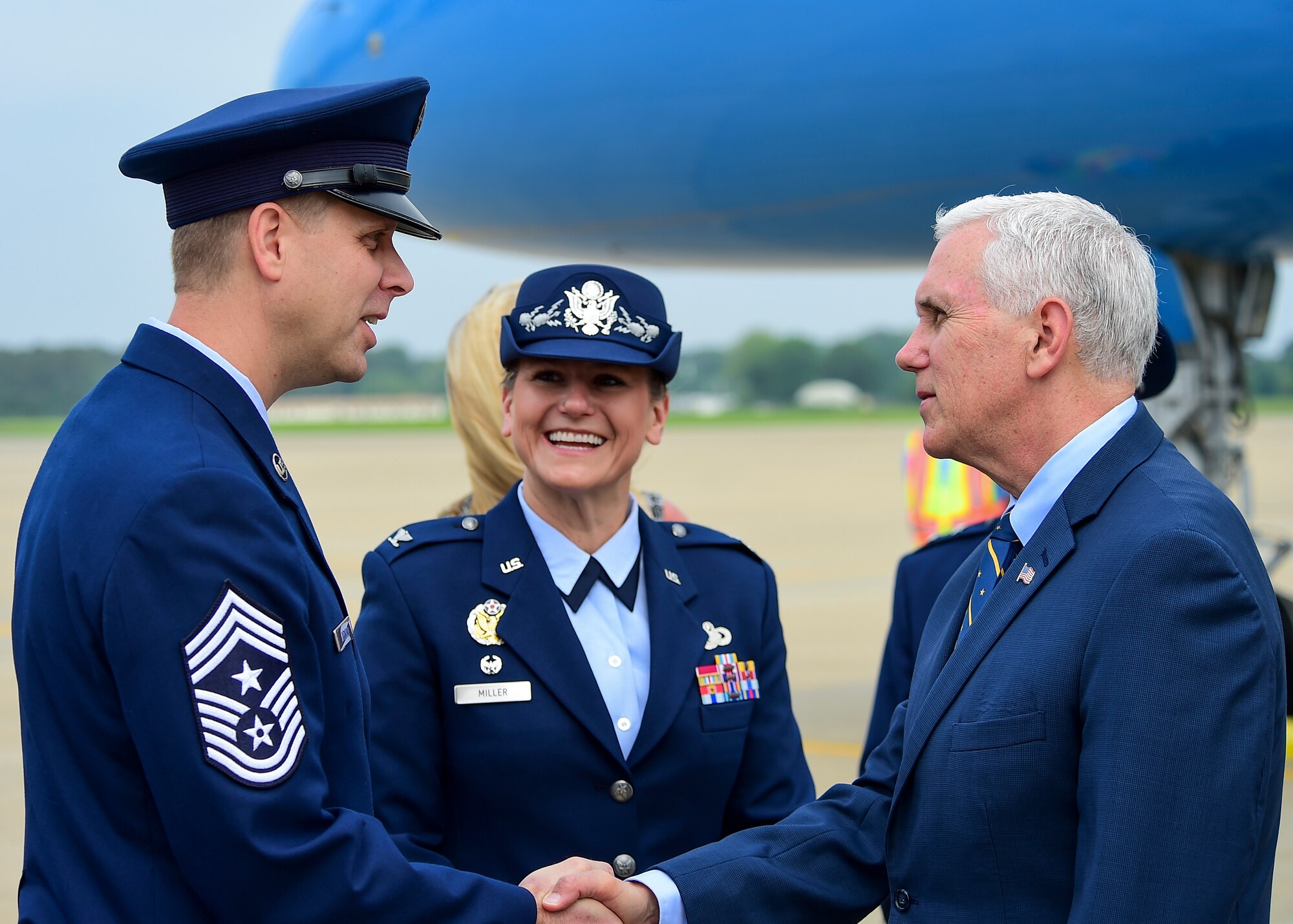 U.S. Vice President Michael R. Pence is greeted by U.S. Air Force Chief Master Sgt. Kennon Arnold, 633rd Air Base Wing command chief, and U.S. Air Force Col. Caroline Miller, 633rd ABW commander, at Joint Base Langley-Eustis, Va., April 29, 2017. After visiting JBLE, Pence presented a keynote speech for the Christening Ceremony of the U.S. Navy’s newest attack submarine at the Newport News Shipyard. (U.S. Air Force photo/Senior Airman Derek Seifert)