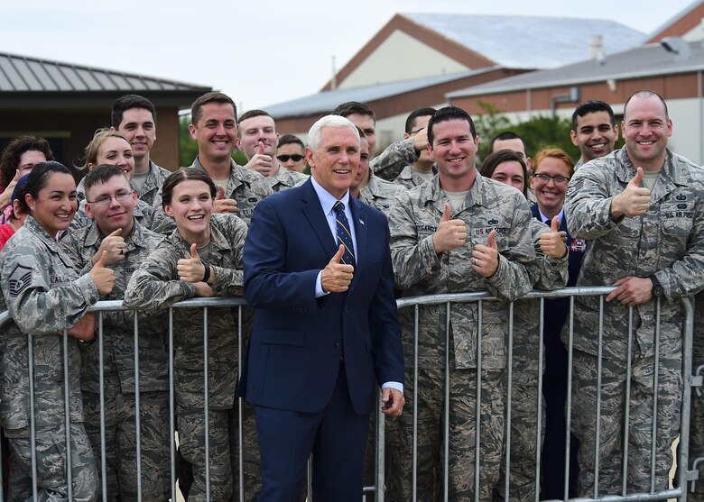 U.S. Vice President Michael R. Pence poses with service members for a photo at Joint Base Langley-Eustis, Va., April 29, 2017. Pence visited with the JBLE community before traveling to the  Newport News Shipyard  for the Christening Ceremony of the U.S. Navy’s newest attack submarine. (U.S. Air Fore photo/Senior Airman Derek Seifert) 