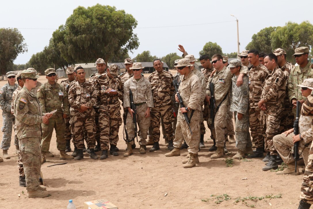 U.S. Army Sgt. Amanda Such, a military policeman with the 805th Military Police Company in Cary, North Carolina, teaches a class on vehicle control points to soldiers, Marines and Royal Moroccan Armed Forces in TIfnit, Morocco, on April 22, 2017, during Exercise African Lion. Exercise African Lion is an annually scheduled, combined multilateral exercise designed to improve interoperability and mutual understanding of each nation’s tactics, techniques and procedures.