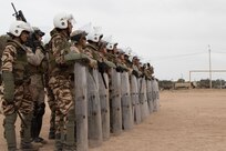 U.S. Soldiers, Marines, and Royal Moroccan Armed Forces prepare to conduct crowd control training during Exercise African Lion in Tifnit, Morocco, on April 24, 2017. Exercise African Lion is an annually scheduled, combined multilateral exercise designed to improve interoperability and mutual understanding of each nation’s tactics, techniques and procedures.
