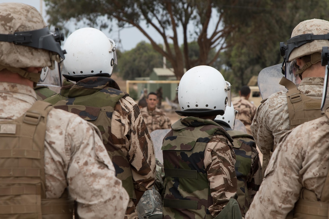 Marine Company B, 4th Law Enforcement Battalion from Pittsburg, Pennsylvania, and Royal Moroccan Armed Forces defend against rioters during crowd control training in Tifnit, Morocco, on April 24, 2017, during Exercise African Lion. Exercise African Lion is an annually scheduled, combined multilateral exercise designed to improve interoperability and mutual understanding of each nation’s tactics, techniques and procedures.