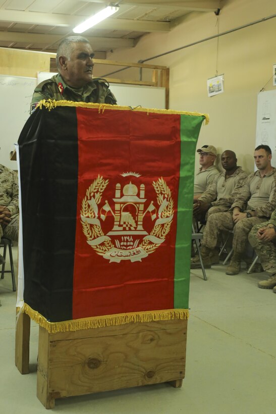 Afghan National Army Col. Shahwali Zazai, the commanding officer of the Helmand Regional Military Training Center, speaks during a graduation ceremony at Camp Shorabak, Afghanistan, April 26, 2017. More than 60 ANA soldiers recently completed a six-week medical training course, improving their tactical and expeditionary combat care skills. U.S. Army unit Task Force Forge aided in the instruction of the course, and is scheduled to relinquish command as the main advisory element in Helmand Province to the U.S. Marine unit Task Force Southwest. The oncoming unit is comprised of approximately 300 Marines and Sailors, whose mission will be to train, advise and assist the ANA 215th Corps and 505th Zone National Police. (U.S. Marine Corps photo by Sgt. Lucas Hopkins)