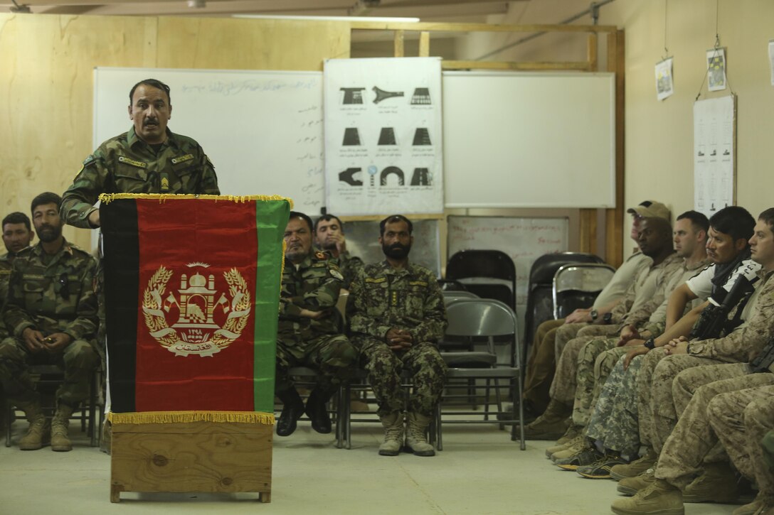 An Afghan National Army soldier speaks during a Helmand Regional Military Training Center graduation ceremony at Camp Shorabak, Afghanistan, April 26, 2017. Members of the ANA 215th Corps, U.S. Army soldiers with Task Force Forge and Marines and Sailors with Task Force Southwest attended the ceremony, which commemorated more than 60 ANA soldiers’ recent completion of a six-week medical training course. (U.S. Marine Corps photo by Sgt. Lucas Hopkins)
