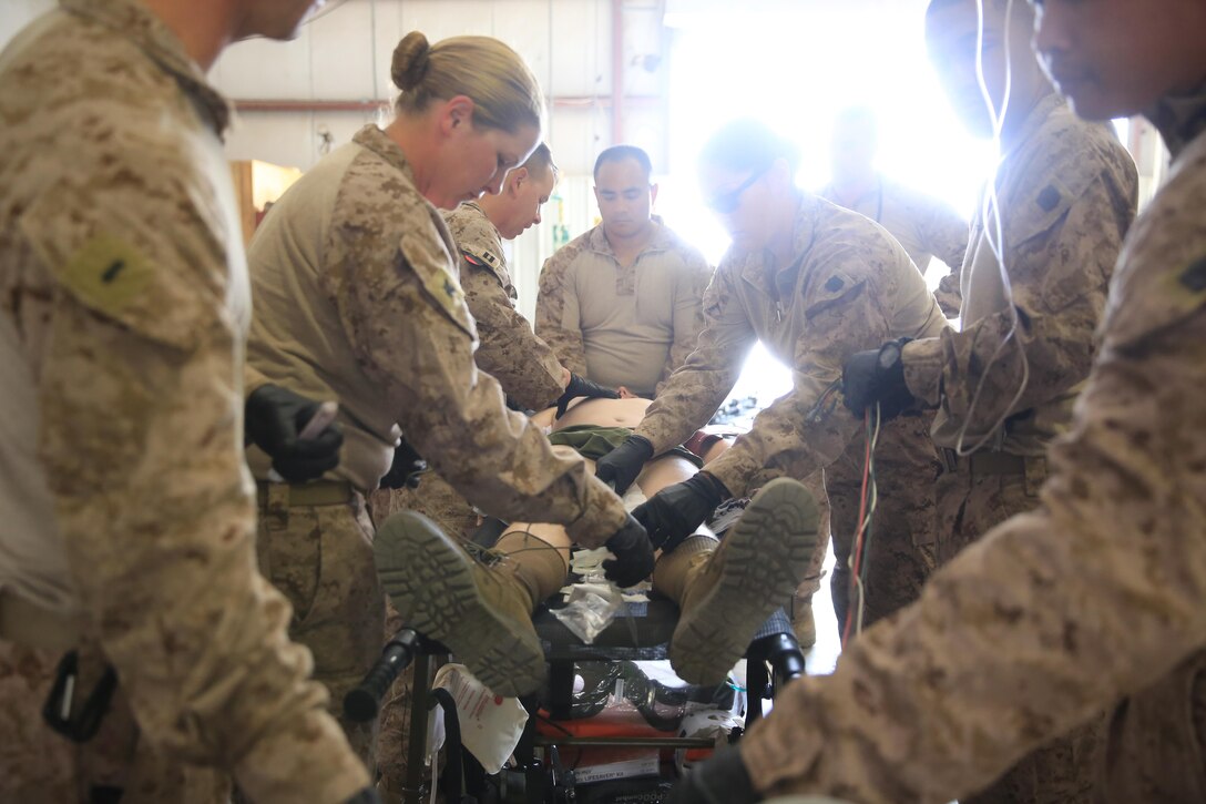 U.S. Sailors with the Shock Trauma Platoon, Special Purpose Marine Air-Ground Task Force-Crisis Response-Central Command, rehearse their emergency medicine capabilities on a simulated casualty while forward deployed in the Middle East, April 23, 2017. The exercise demonstrated the STP’s ability to care for critically injured casualties in a limited resource environment enhancing the SPMAGTF’s ability to respond to any crisis that may occur in the U.S. Central Command area of responsibility. The STP continues to become more adaptable by training with scalable options for personnel, equipment, and supplies to provide the SPMAGTF with a more agile and maneuverable role-2 medical capability. (U.S. Marine Corps photo by Cpl. Kyle McNan)  