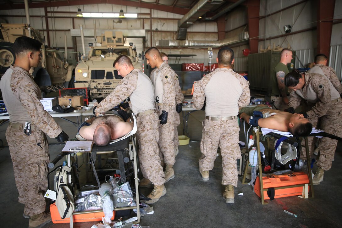 U.S. Sailors with the Shock Trauma Platoon, Special Purpose Marine Air-Ground Task Force-Crisis Response-Central Command, rehearse their emergency medicine capabilities on simulated casualties while forward deployed in the Middle East, April 23, 2017. The exercise demonstrated the STP’s ability to care for critically injured casualties in a limited resource environment enhancing the SPMAGTF’s ability to respond to any crisis that may occur in the U.S. Central Command area of responsibility. The STP continues to become more adaptable by training with scalable options for personnel, equipment, and supplies to provide the SPMAGTF with a more agile and maneuverable role-2 medical capability. (U.S. Marine Corps photo by Cpl. Kyle McNan)  