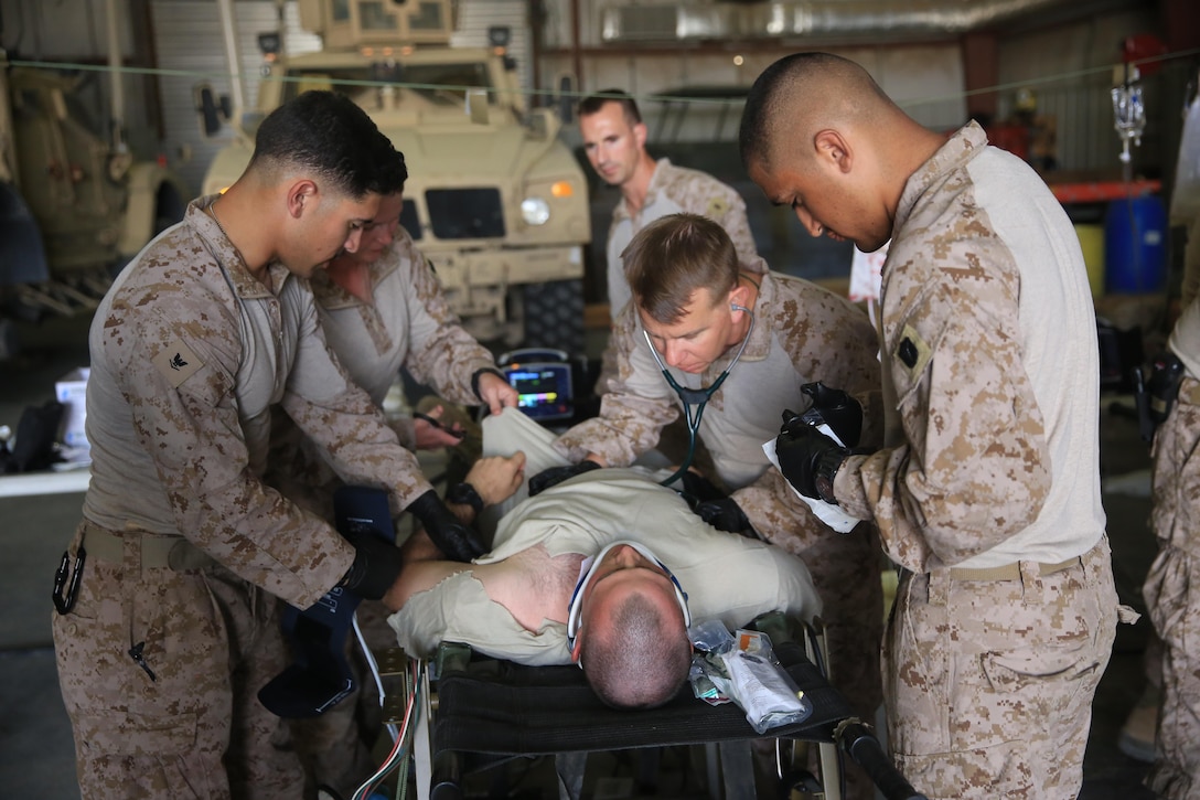 U.S. Sailors with the Shock Trauma Platoon, Special Purpose Marine Air-Ground Task Force-Crisis Response-Central Command, rehearse their emergency medicine capabilities on a simulated casualty while forward deployed in the Middle East, April 23, 2017. The exercise demonstrated the STP’s ability to care for critically injured casualties in a limited resource environment enhancing the SPMAGTF’s ability to respond to any crisis that may occur in the U.S. Central Command area of responsibility. The STP continues to become more adaptable by training with scalable options for personnel, equipment, and supplies to provide the SPMAGTF with a more agile and maneuverable role-2 medical capability. (U.S. Marine Corps photo by Cpl. Kyle McNan)  