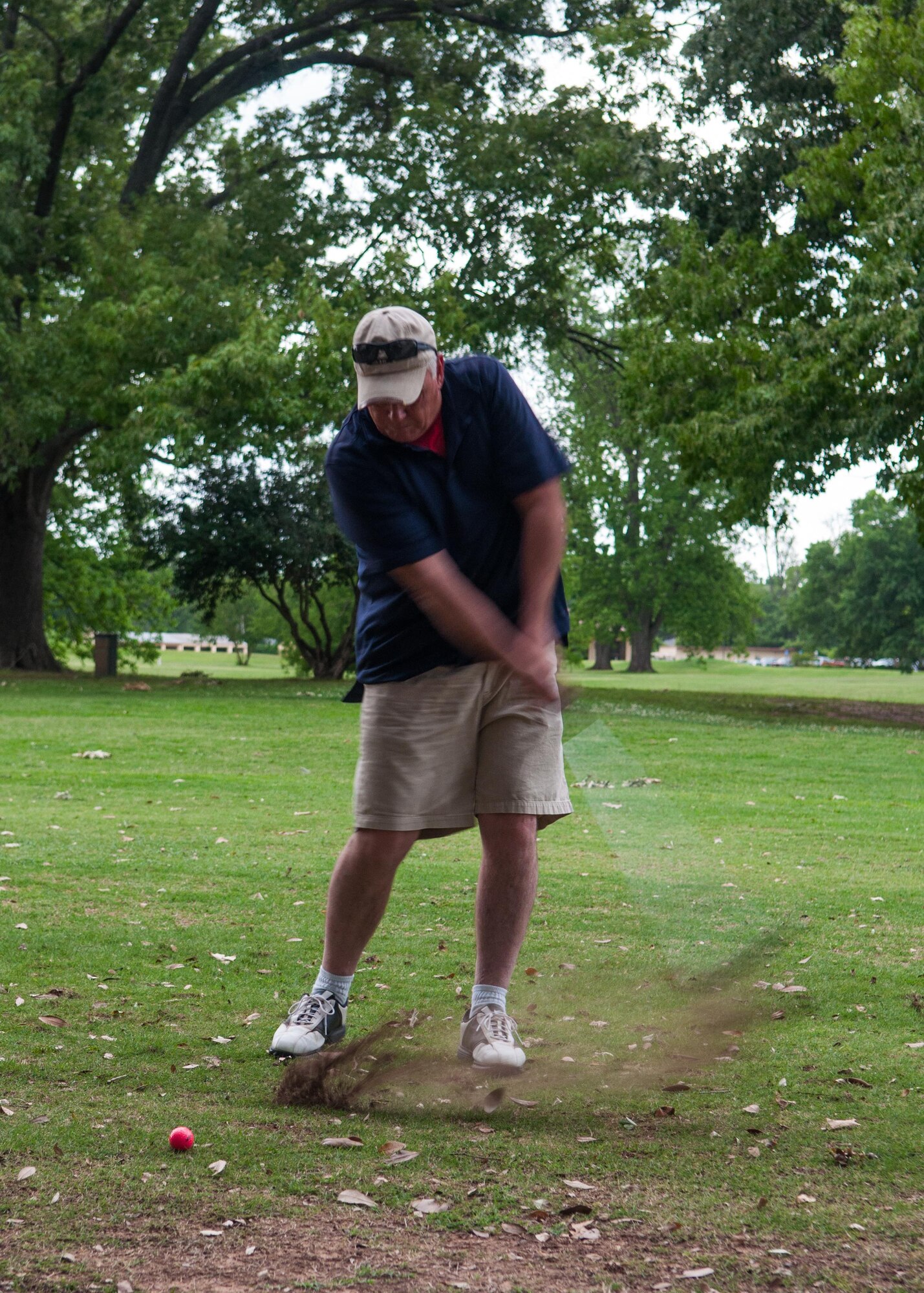 Senior Master Sgt. Joel Womack, assigned to the 307th Operations Support Squadron, takes a shot during the golf tournament at the Fox Run Golf Course during the 307th Bomb Wing Family Day at Barksdale Air Force Base, La., April 29, 2017. Golf was one of many events that Airmen and their families participated in including basketball, horseshoes, archery and bowling. (U.S. Air Force photo by Tech. Sgt. Cody Burt/Released)