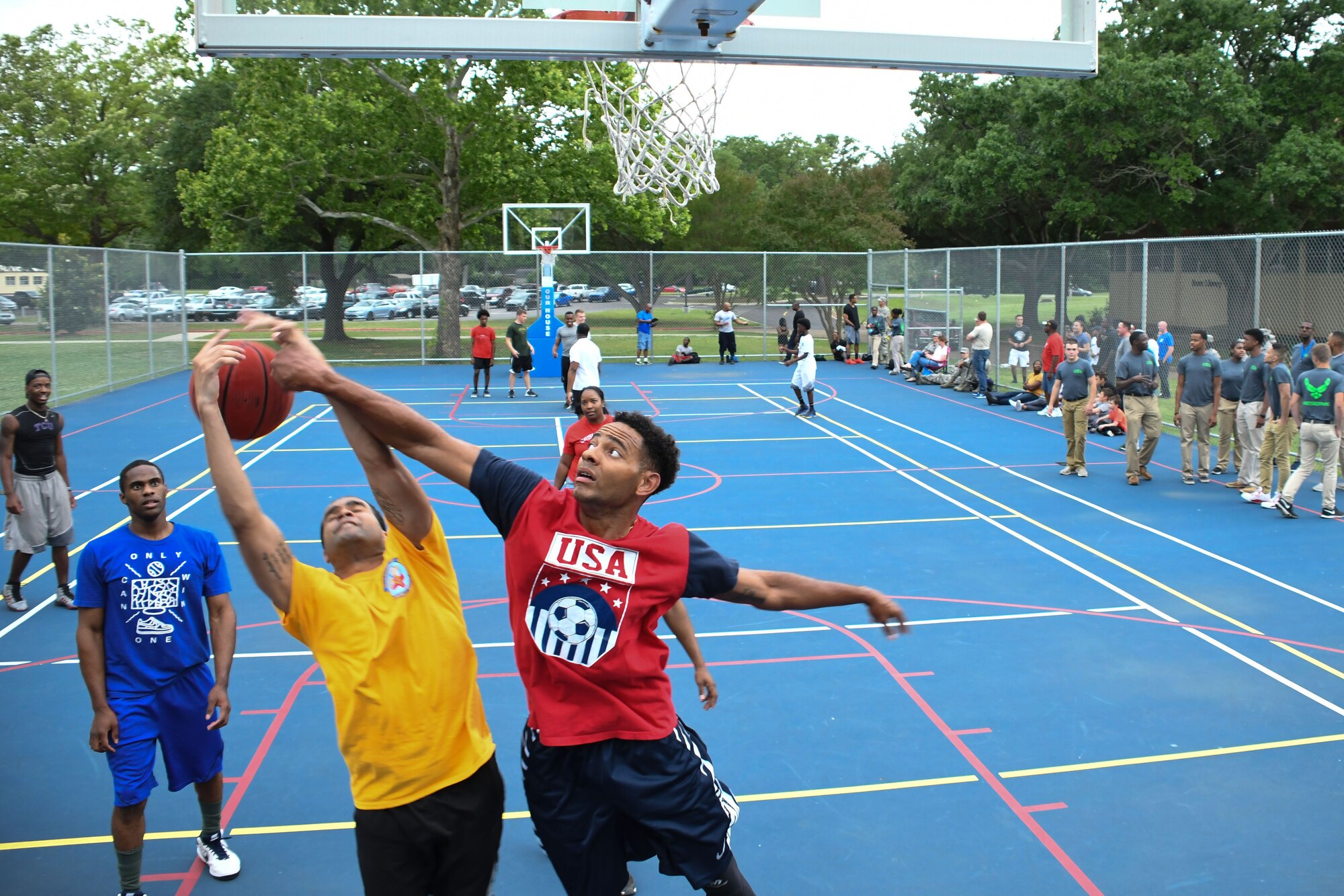Members of the 307th Bomb Wing play for keeps during Family Fun Day activities at Barksdale Air Force Base, La., April 29, 2017.  Threatening weather did not deter Airmen and their family members from turning out in large numbers to enjoy a host of athletic events including basketball, horse shoes, archery, bowling and golf.   Participants also enjoyed barbecue, fun jumps and a vintage car show.  (U.S. Air Force photo by Tech. Sgt. Ted Daigle/Released)
