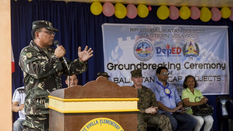 Philippine Soldier Col. Lowal R. Tan speaks to a crowd during a ground breaking ceremony for Balikatan 2017 in Ormoc City, Leyte, April 25, 2017. Tan is the deputy commander of the 802nd Infantry Brigade, 8th Infantry Division. Leaders from the Armed Forces of the Philippines, U.S. military, and Ormoc City gathered to commemorate the beginning of engineering projects for new classrooms at Don Carlos Elementary School in Ormoc City. Balikatan is an annual U.S.-Philippine military bilateral exercise focused on a variety of missions, including humanitarian assistance and disaster relief and counterterrorism. 