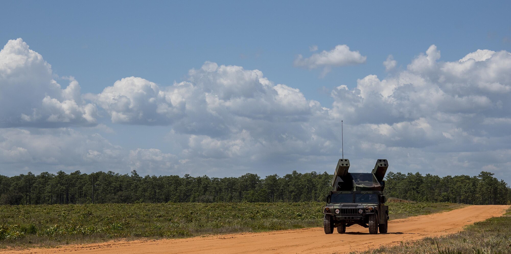 The Army Avenger’s turret rotates as the vehicle drives down an Eglin Air Force Base range road April 20.  The Florida National Guard’s 3rd Battalion, 265 Air Defense Artillery Regiment along with the Army’s Stinger Based Systems used the range to test fire stinger missiles from the vehicle. (U.S. Air Force photo/Samuel King Jr.)