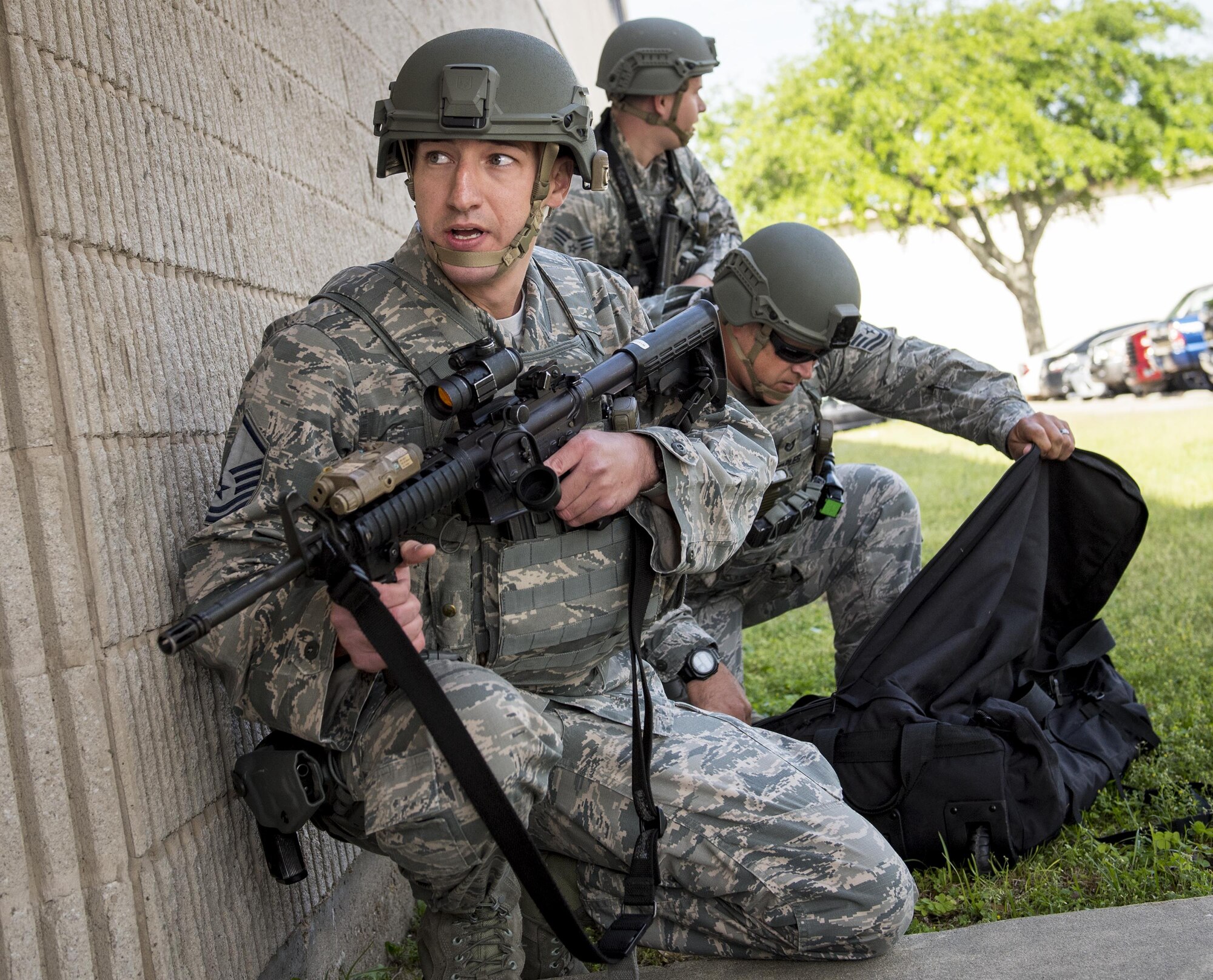 Master Sgt. Shane Zugai, 96th Security Forces Squadron, watches the building’s entrance during an active shooter exercise at Eglin Air Force Base, Fla., April 11.  The goal of the exercise was to evaluate people’s knowledge and response at the active shooter location and select lockdown locations.  (U.S. Air Force photo/Samuel King Jr.)