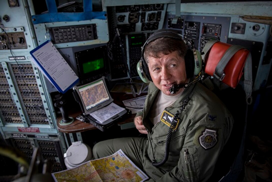 Col. Neil R. Richardson, 374th Airlift Wing vice commander, communicates with a pilot during his “fini” flight, April 12, 2017, over mainland Japan. Richardson is a C-130E/H Hercules master navigator and former U.S. Air Force Weapons Instructor Cadre. (U.S. Air Force photo by Airman 1st Class Donald Hudson)