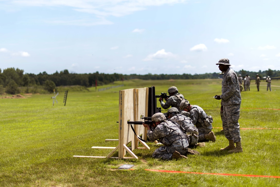 Guardsmen fire M-16 rifles at targets during the 46th Winston P. Wilson Championships at the National Guard Marksmanship Training Center in North Little Rock, Ark., July 24, 2017. Army photo by Staff Sgt. Jeremiah Runser