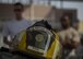 Airmen stand ready for bunker drills during Fire Immersion Training July 28, 2017, Al Dhafra Air Base, United Arab Emirates. Training provided Airmen from around the installation with a hands-on perspective of what it takes to be a firefighter. (U.S. Air Force photo by Senior Airman Preston Webb)