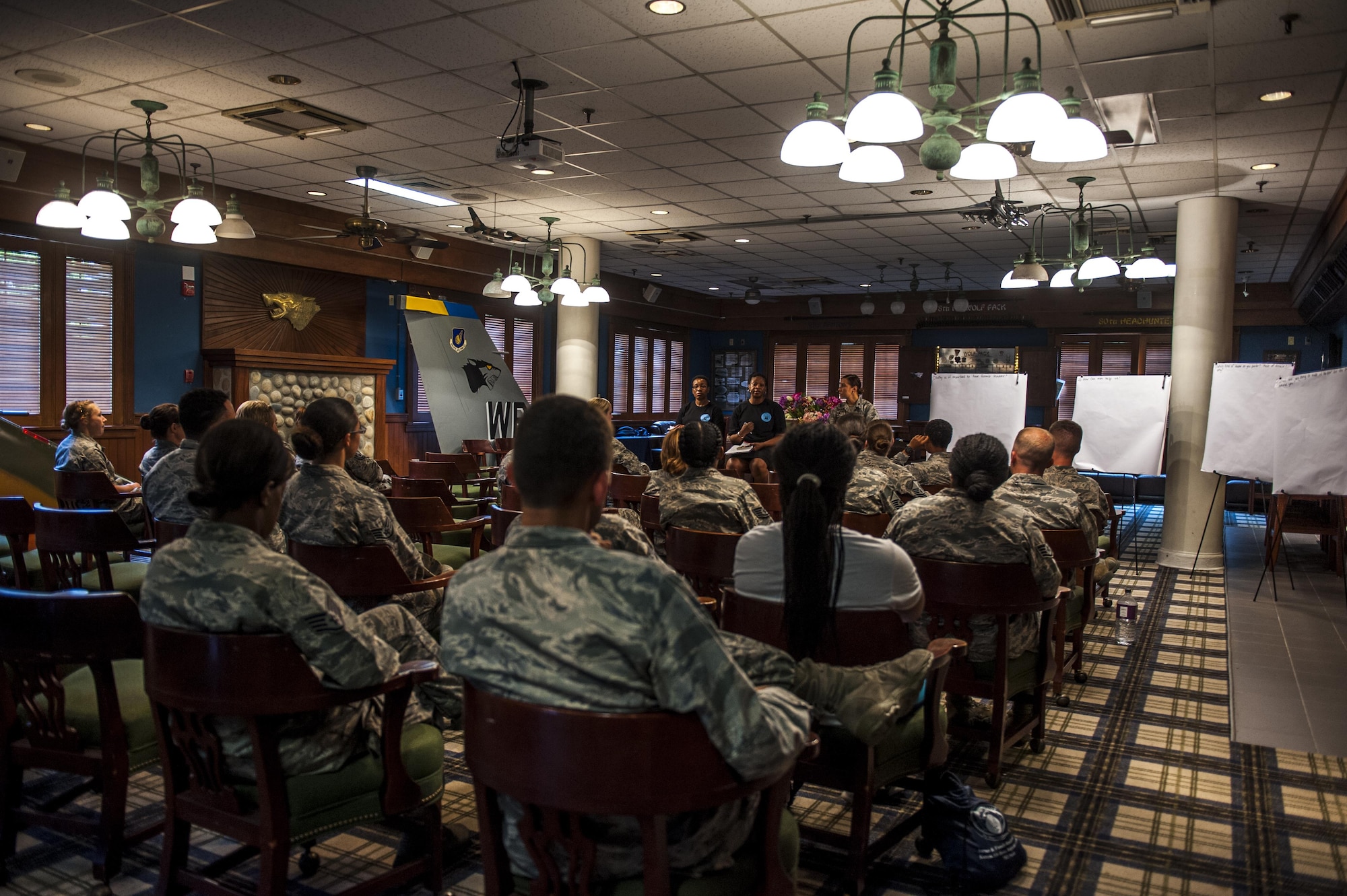 U.S. Air Force members attend a Leanin Together luncheon on Aug. 26, 2017 at Kunsan Air Base, Republic of Korea. The Leanin Together luncheon allows women and men to recognize and work through internal and external barriers with guidance from female leaders and the support of men. (U.S. Air Force photo by Senior Airman Colville McFee/Released)