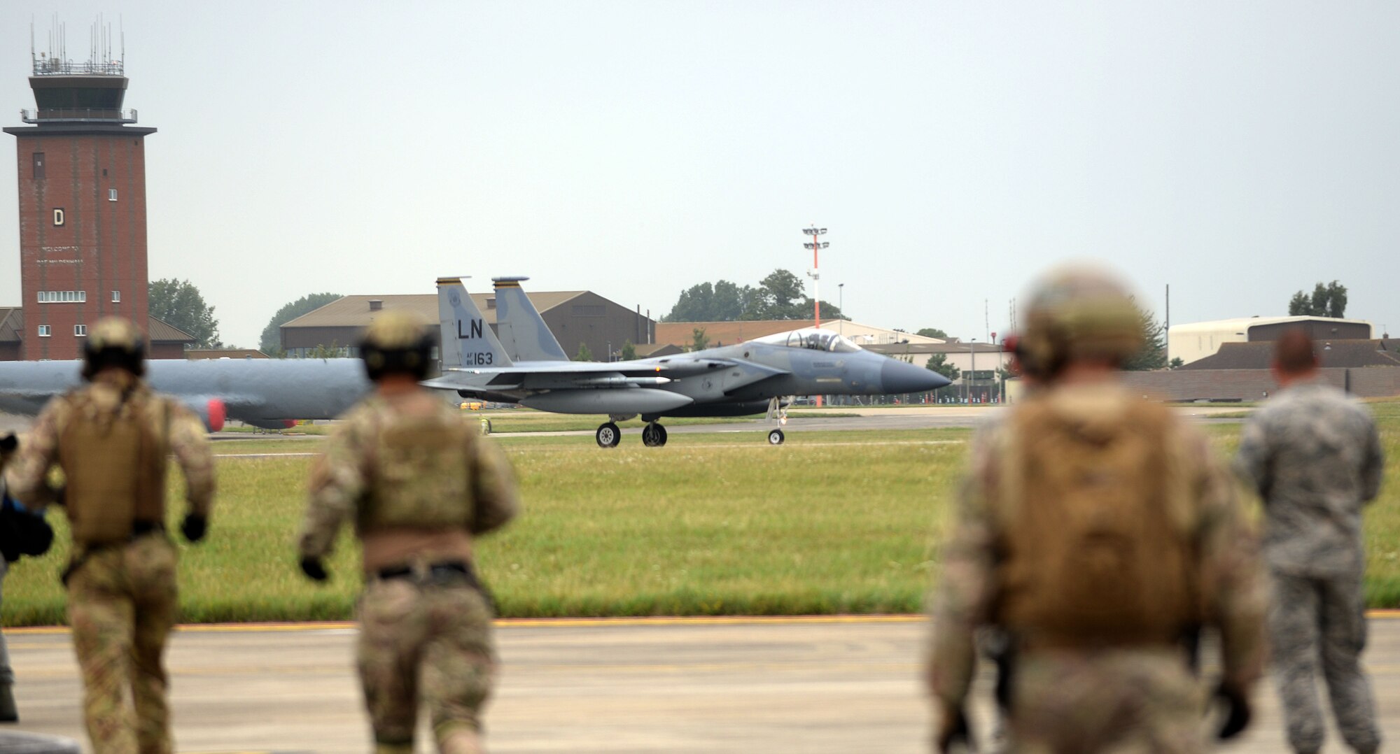 A U.S. Air Force F-15C Eagle lands on RAF Mildenhall, England, before being refueled by an MC-130J Commando II July 26, 2017. Exercise Rapid Eagle is the first time a Forward Arming and Refueling Point exercise was conducted with an MC-130 and an F-15C. (U.S. Air Force photo by Airman 1st Class Luke Milano)