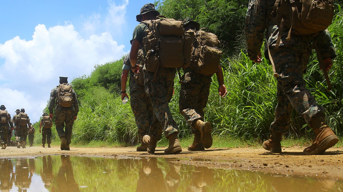 Lance Cpl. Jeanette E. Fernando and other Marines with Marine Light Attack Helicopter Squadron 169, hike towards the Iwo Jima memorial site on Mt. Suribachi, Iwo Jima, Japan, July 26, 2017. Fernando and other Marines in her squadron were given the opportunity to revisit the battlegrounds at which Fernando's grandfather, a Navajo Code Talker, fought during World War II. Fernando is an airframe mechanic assigned to HMLA-169, Marine Aircraft Group 39, 3rd Marine Aircraft Wing, currently on a unit deployment program with 1st MAW based in Okinawa, Japan. (U.S. Marine Corps photo by Sgt. Laura Gauna)