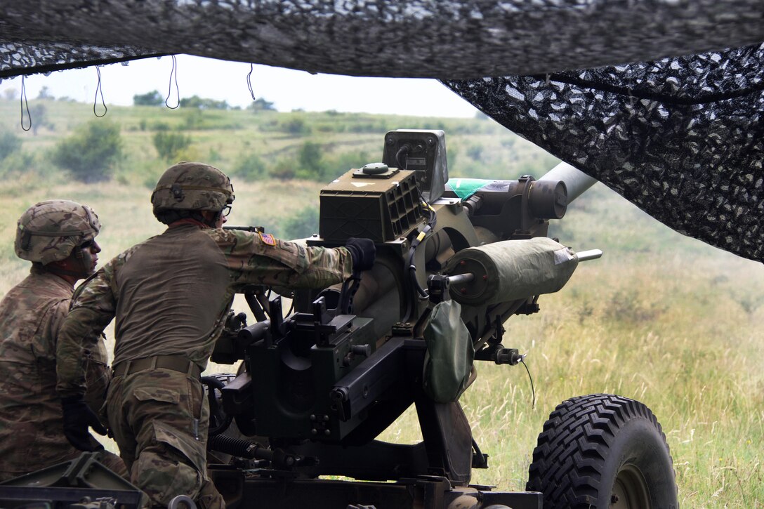 Paratroopers prepare to fire a 119A3 howitzer during a live-fire, part of exercise Saber Guardian near Turzii, Romania, July 24, 2017. The paratroopers are assigned to the 4th Battalion, 319th Airborne Field Artillery Regiment, 173rd Airborne Brigade. Saber Guardian is a U.S. Army Europe-led, multinational exercise across Bulgaria, Hungary and Romania with more than 25,000 troops from 22 allied and partner nations. Army photo by Spc. Cheyenne Shouse